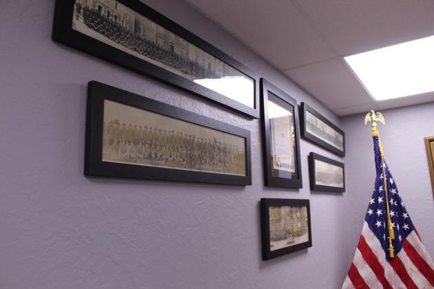 Several historic group photographs and a document from WWI are among those which were professionally framed and are now on display at the Shawnee American Legion Gill-Mattox Post 16.