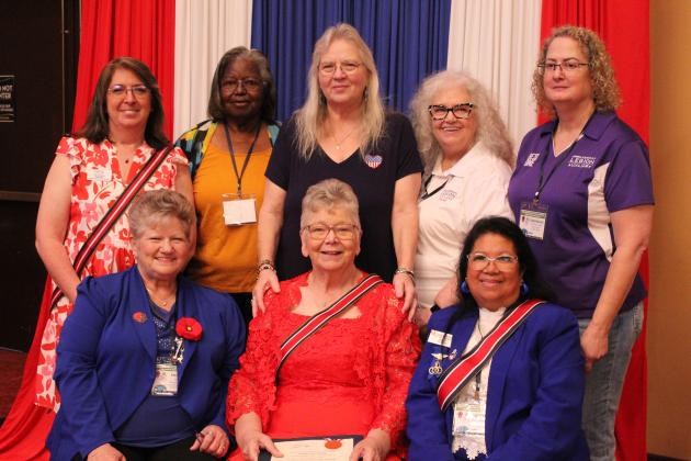 Donna Snodgrass poses with the American Legion Auxiliary Department of Oklahoma Board and two national officers at the inauguration. Shown are, front row, Vickie Thrower-Mills, National Vice President, Southern Division; Snodgrass, President; Susan Engstrom, National Executive Committee Chairman; back row, Kim McInnis, Past President; Nellie Caldwell, Historian; Lorraine Kruskopp, Chaplain; Edie Thomas, Second Vice President; and Charmaine Miller, First Vice President.
