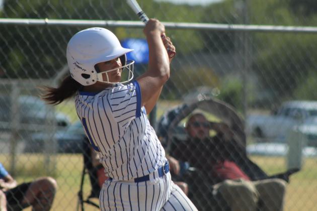 Bethel freshman KJ Anthony dings a double in the first inning of the Aug. 17 home game against Prague. The Lady Wildcats won, 11-5, and have a record of 7-1 so far.