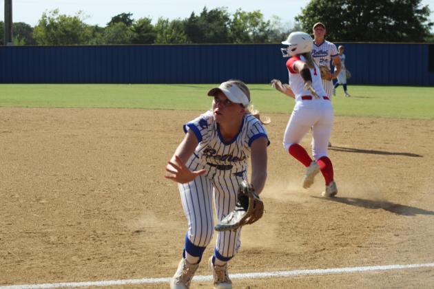 Bethel senior Kinley Anthony looks to make the catch at first base in the first inning of the Aug. 17 home game against Prague. The Lady Wildcats won, 11-5, and have a record of 7-1, so far.