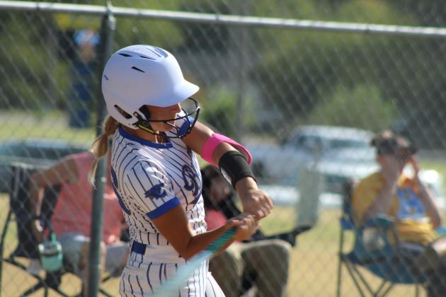 Bethel senior Bailey Tucker tags a triple in the first inning of the Aug. 17 home game against Prague. The Lady Wildcats won, 11-5, and have a record of 7-1 so far.