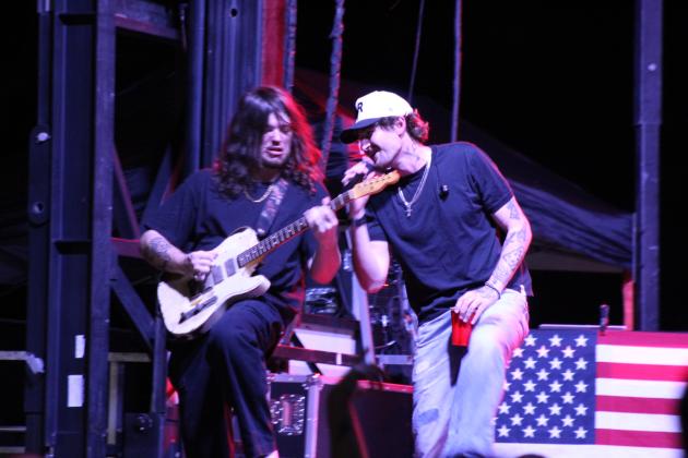 Austin Snell, of Nashville, and his band performs at the FireLake Fireflight Balloon Festival Aug. 8.
