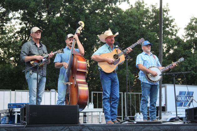 Oklahoma Line, formerly the Jody Schmidt Band, performs "Simple Man" on Friday night, Aug. 7, during the FireLake Fireflight Balloon Festival. The bluegrass and country band will play the Bluegrass and Chili Festival in Tahlequah next on Sept. 12. Kaleb Austin and Austin Snell also performed at the festival on Aug. 8 at the CPN Festival Grounds in Shawnee.