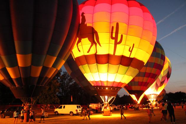 "Champagne Cowboy" owned by Dennis Short of Broken Arrow, participated in the balloon glow on Friday night, Aug. 7.