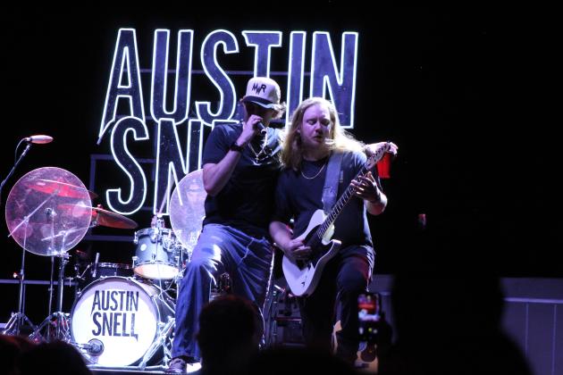 Austin Snell, of Nashville, and his band performs at the FireLake Fireflight Balloon Festival Aug. 8.
