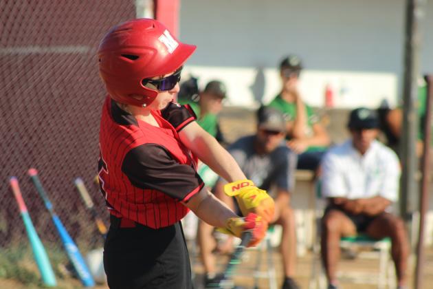 Macomb sophomore William Rhea takes a swing at bat during the Aug. 28 home game against Stonewall. The Macomb Hornets lost, 0-15.