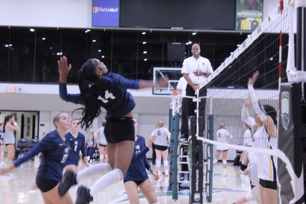 Shawnee senior JaNya Bruner prepares to make an attack during the Shawnee Volleyball Invitational match against Santa Fe South at OBU on Sept. 18. The Lady Wolves won that match, 2-0, as well as the match against Sapulpa, 2-0, but lost to Altus, 0-2, on the same day. On Sept. 19, they fell to Cascia Hall and again to Altus, 0-2 both matches. Photos by Natasha Dunagan, Countywide &amp; Sun