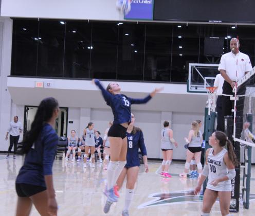 Shawnee junior Kensley Whittington jumps to make the attack during the Shawnee Volleyball Invitational match against Santa Fe South at OBU on Sept. 18. The Lady Wolves won that match, 2-0, as well as the match against Sapulpa, 2-0, but lost to Altus, 0-2, on the same day. On Sept. 19, they fell to Cascia Hall and again to Altus, 0-2 both matches.