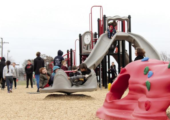 Children in the Macomb 21st CCLC After School Program play on the new playground at Macomb Elementary School on Feb. 6. The playground was made possible by the Citizen Potawatomi Nation, the educaton half-cent sales tax, Pottawatomie County District 2, and Great Plains Kubota in Shawnee. During the event, Superintendent Matt Riggs spoke, followed by a ribbon-cutting ceremony and their annual Kindness Dinner. Countywide &amp; Sun/Natasha Dunagan