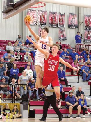 Bethel senior John Gordon rises above the competition during the Class 3A Regional game against Kingston at Prague on March 1. The Bethel Wildcats won that game, 51-48. Photo provided by Richelle Treece.