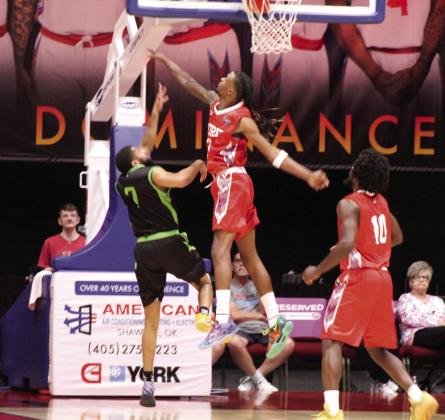 Potawatomi Fire Forward Ricky Artis II blocks a shot in the second quarter of the March 20 home game against the Little Rock Lightning. The Fire won, 121-96, making their record for the season 4-0, according to www. potawatomifire.com. Photos by Natasha Dunagan, Countywide &amp;amp; Sun
