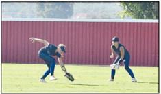 Center Field Brooklyn Duff catches the ball while Gascon stays ready.