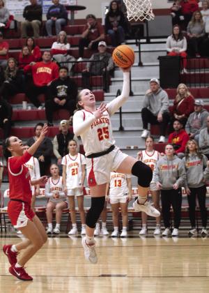 Dale senior Teague Muncy runs in a basket in the fourth quarter.