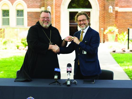The Rt. Rev. Lawrence Stasyszen, O.S.B., Abbot of St. Gregory’s Abbey, left, and Oklahoma Baptist University President Dr. Heath Thomas announced a property exchange to transfer the 74-acre OBU Green Campus, formerly St. Gregory’s University, to the Abbey in exchange for two parcels of land for future develop-