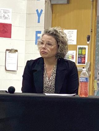 Assistant Superintendent, Brandi Burks listens to Robert Kinsey address the board during the Superintendent’s report. Countywide &amp;amp; Sun/Julie Taton