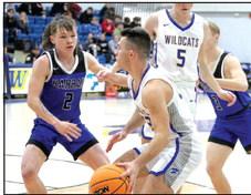Bethel senior Bray Bussell looks for an opening during the Jan. 9 Harrah game. Bussell recently joined the 1,000-point club. File photo.