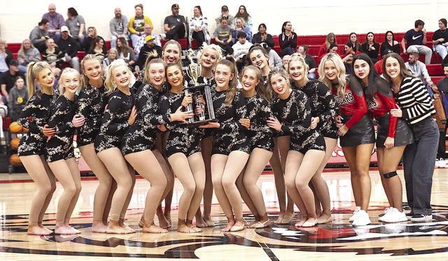The North Rock Creek Pom Team receives the OSDTDA 4A Mix State Championship trophy. Photo Provided by Gowin Photography