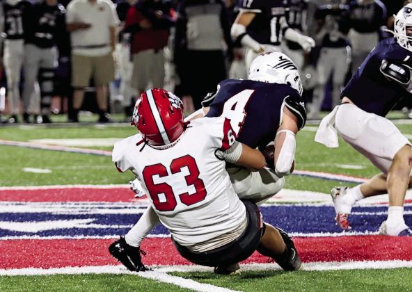 North Rock Creek’s Andrew Ritter makes the tackle.