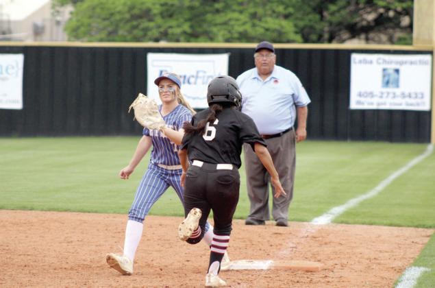Bethel junior Payton Epperley makes the catch before a Purcell runner makes it to first. Natasha Dunagan, Countywide &amp;amp; Sun