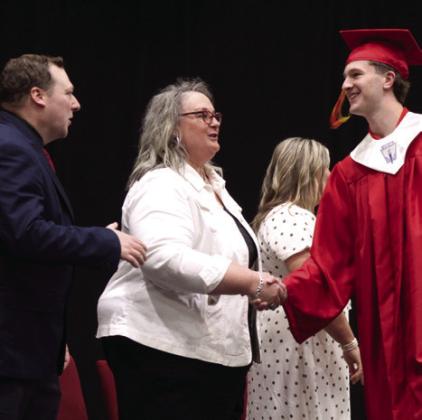 The Dale High School Valedictorians - Andrew Collins, Aidan Taylor, Kamren Wilson, Easton Howe, Gael Ramirez, Ford Hampton, Denton Forsythe, Kaylyn Solis, Zairek Chavez, Audrina 'Boo' Herber, Paul Potts and Aimee Rogers - are recognized during graduation on May 21 at FireLake Arena. Collins and Taylor addressed their class. Natasha Dunagan, Countywide &amp;amp; Sun