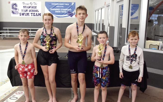 Five junior athletes braved the storms Saturday morning to compete in the YMCA Healthy Kids Triathlon. They all received a medal of completion; 1st-3rd received trophies. From left: Levi Williams, Faith Stacy, Liam Tilley, Landon Williams, and Beckham Stacy.