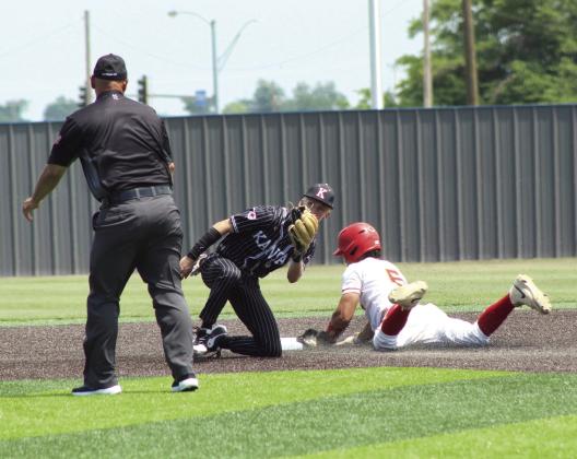 Dale junior Braylon White dives to steal second in the third inning of the Class 2A1 State Baseball Quarterfinal game against Kansas on May 14. Natasha Dunagan, Countywide &amp; Sun