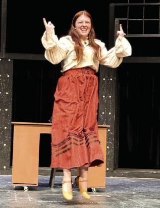Katherine (Maya Corley) gets excited.