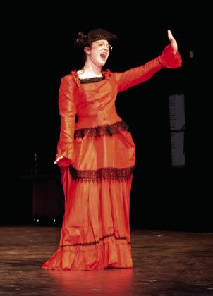 Medda Larkin (Gabbi Garza) belts out a solo.