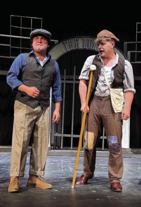 Jack Kelly (Cooper Lincoln) and Crutchie (Aaron Aguirre) develop a plan for the Newsies.