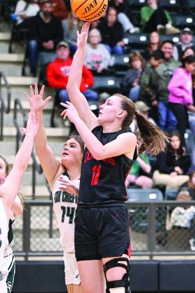 Pictured above, North Rock Creek’s Lydia VanAntwerp makes the bucket.