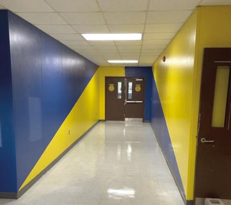 The entryway into the McLoud High School Agriculture building was repainted by students to “give it more of an FFA welcome,” said new Agriculture teacher Steve Flowers.
