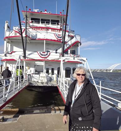 Arthenia Haney of Tecumseh stands on the deck of the Mississippi paddle boat 'Liberation Belle' earlier this month. Photo provided