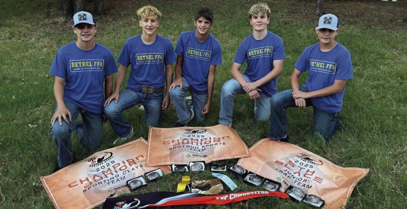 The Bethel Junior Shooting Sports Team - Cayden Roberts, Barrett Nunneley, Blaze Tarbox, Landon Boles and Jaxon Roberts - poses with their banners and belt buckles after winning Champion Junior Sporting Clays Team, Champion Junior Shotgun Sports Team and fifth place in Junior Trap Team at the Oklahoma Youth Expo last month. Photo courtesy of Dr. Brett Scott