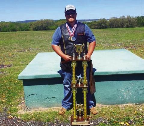 Tecumseh Graduate Is Twice National Champion On College Shooting Team - Shown here with ACUI trophy