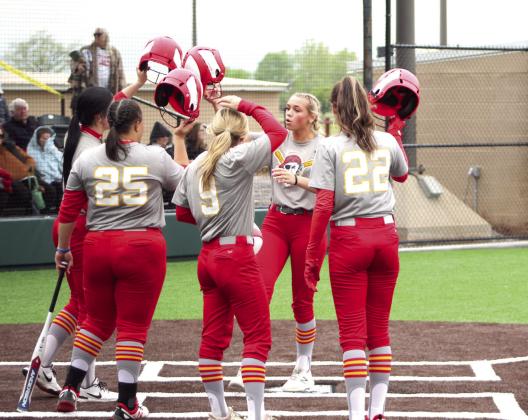 Dale senior Chayse Caram hits helmets with her teammates after hitting a homerun in the third inning of the game with Wayne on April 27. Dale won that game, 18-12, as well as the game with Boone-Apache, 17-4, to win the Class 3A Regional Slow Pitch Tournament at FireLake Ball Fields. The Lady Pirates began State play Wednesday. Watch next week’s Countywide &amp;amp; Sun for story and photos. Countywide &amp;amp; Sun/Natasha Dunagan