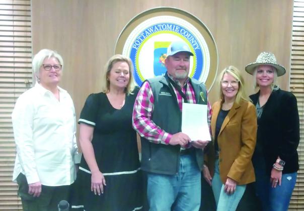 Pottawatomie County Commissioners proclaim May 4-10 Small Business Week. Pictured from left are Uncommon Threads owner Theresa Cody, Shawnee Forward President and CEO Crystal Romanyszyn, Dist. 2 Commissioner Greg Rush, Dist. 1 Commissioner Melissa Dennis, and Dist. 3 Commissioner Abby Thompson. Bill Rooth, Countywide &amp; Sun