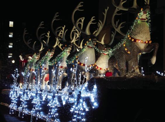 With Safe Events for Families back holding the reins for the Shawnee Parade of Lights, Santa was off the fire engine and back in his traditional sleigh pulled by reindeer on Dec. 13. There were also refurbished snowflakes on the sides. This was one of 108 float entries, according to SEFF representative Dell Kerbs. Countywide &amp; Sun/Natasha Dunagan