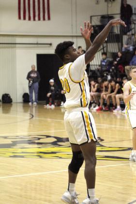 Tecumseh’s Shaun Hill shoots and makes three points during the last few minutes of the home game with North Rock Creek on Jan. 3. Countywide &amp;amp; Sun/Natasha Dunagan