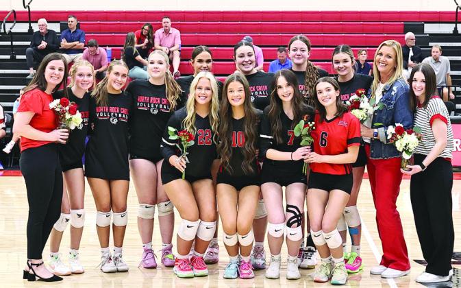 NRC Seniors: Lauren Rowell, Brianna Ogden, Brielle Walker, &amp;amp; Jaynie Ford, surrounded by the volleyball team. Photo Courtesy of Gowin Photography
