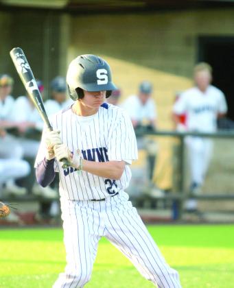 Shawnee freshman Ethan Berger passes on a ball in the March 25 home game with Coweta. Natasha Dunagan, Countywide &amp; Sun
