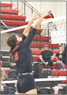North Rock Creek’s Mya Wong defends the net with a block.