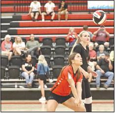 North Rock Creek’s Olivia Terrell with a dig.
