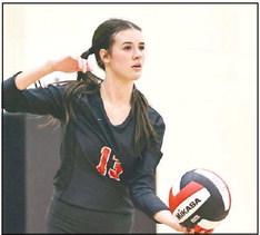 North Rock Creek’s Chloe Kasterke positioned to serve.