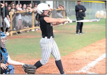 Tecumseh’s Taylor Gage makes a hit during the second game with Little Axe on April 20. Photo provided by Kenetta Lisenbee.