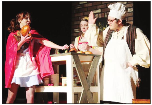 Little Red Ridinghood (Makenzi Stiles), Baker’s Wife (Lillian Effinger), and Baker (Jadon Jackson) rehearse for Tecumseh Vocal Music Program’s production of ‘Into the Woods Jr.’ Performances will be held at the Tecumseh High School Alumni Center, April 7-8. Countywide &amp;amp; Sun/Natasha Dunagan