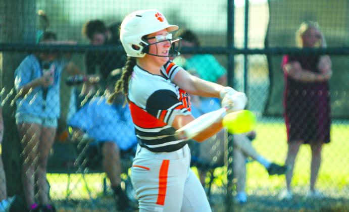 Maud junior Mariah Burkhalter hits a single during the home game against Macomb on Aug. 8.