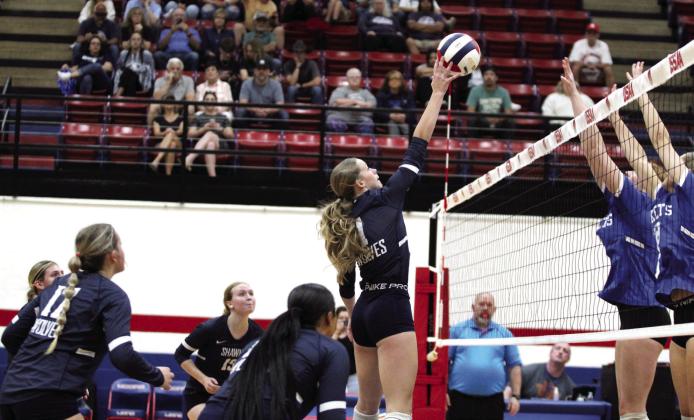 Shawnee senior Josie Megehee blocks the ball during the OSSAA Class 5A Volleyball State Tournament quarterfinals against Mount St. Mary, held at Moore High School on Oct. 24. The Lady Wolves lost, 0-3. They end the season with a record of 28-11. Countywide &amp; Sun/Natasha Dunagan