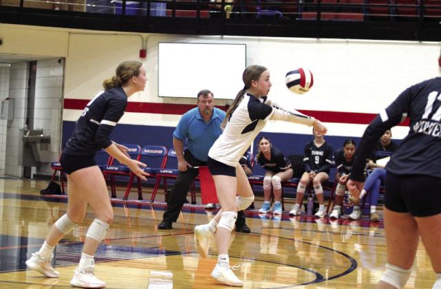 Shawnee Libero Kylee Moore keeps the ball in play, as Micah Teape has her back, during the OSSAA Class 5A Volleyball State Tournament quarterfinals against Mount St. Mary, held at Moore High School on Oct. 24. The Lady Wolves lost, 0-3. They end the season with a record of 28-11. Countywide &amp; Sun/Natasha Dunagan