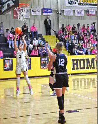 Tecumseh’s Sadie Boatman lines up her shot during the homecoming game against Little Axe on Jan. 28. The Lady Savages won 63-26. Countywide &amp;amp; Sun/ Suzie Campbell