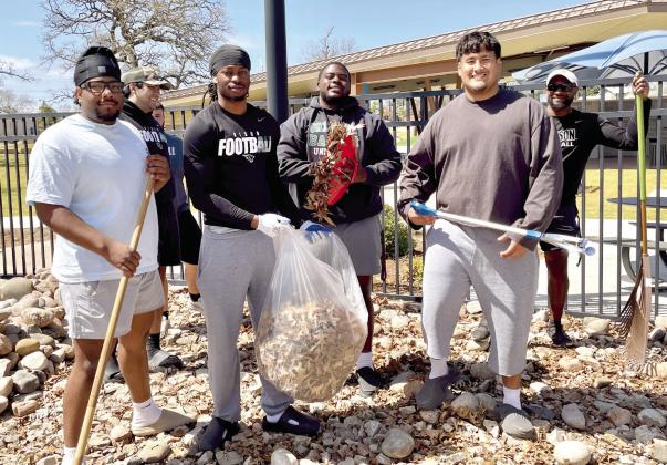 OBU Football help Shawnee Parks Department clean-up the parks, getting ready for spring. Photo Provided